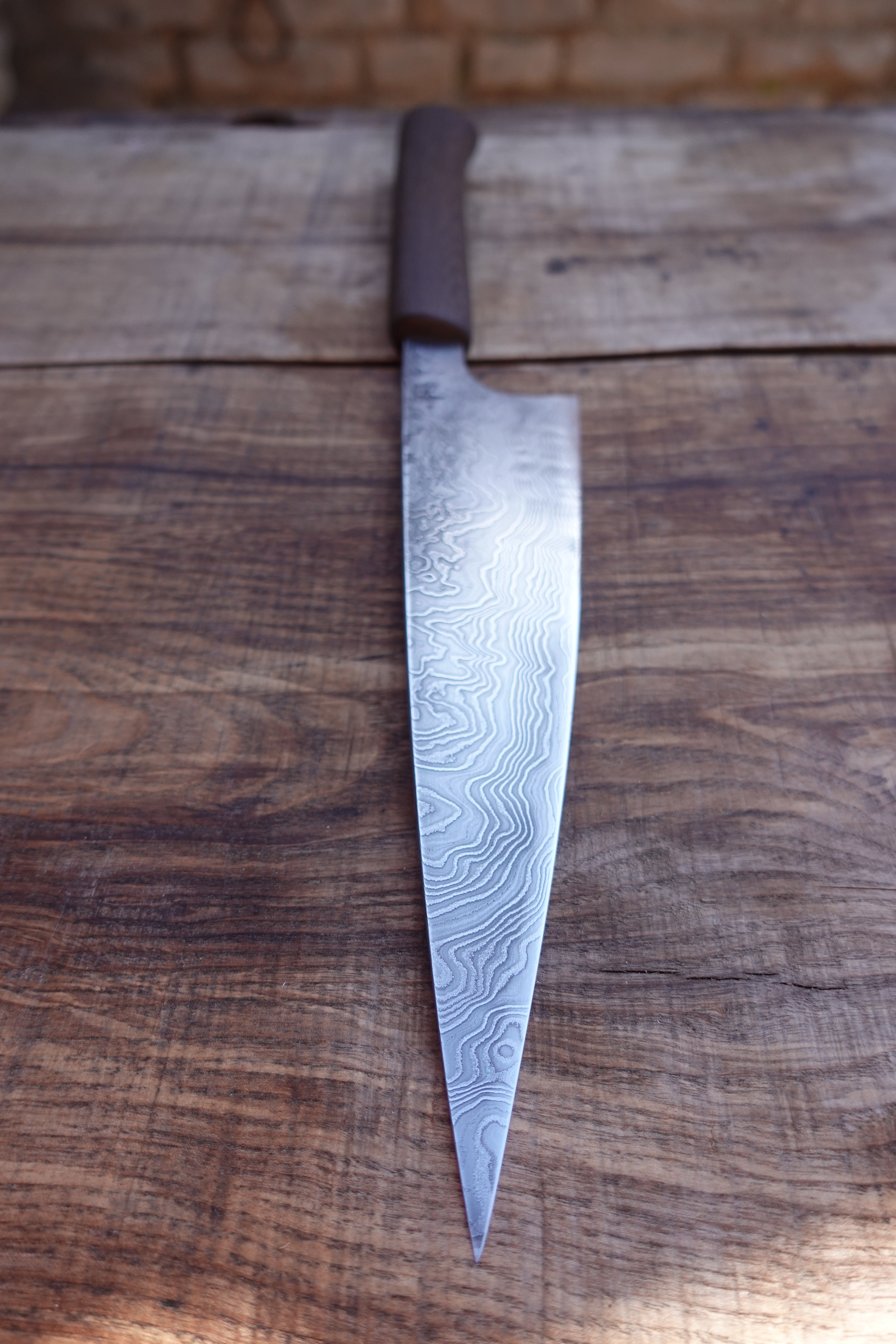 Petty Küchenmesser Götterschmiede handgefertigte Messer handgemachte Messer Klingen Damast Balbach Damast Puddeleisen Laminatstahl Qualität Ästhetik Messermacher Harz handcrafted knives damascus steel traditional forge quality aesthetics